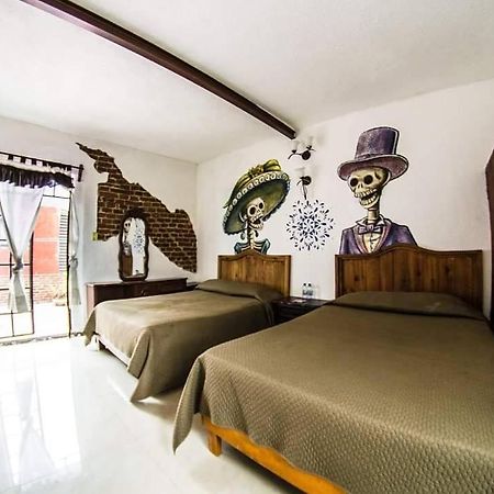 Gente De Mas Hostel ปวยบลา ภายนอก รูปภาพ