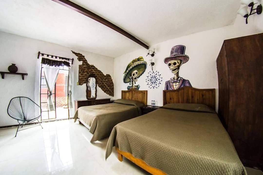 Gente De Mas Hostel ปวยบลา ภายนอก รูปภาพ