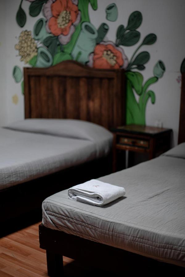 Gente De Mas Hostel ปวยบลา ภายนอก รูปภาพ